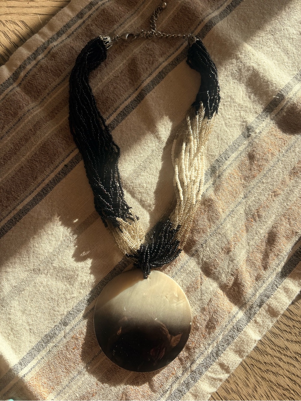 Chico’s Black & Cream Seed Bead Necklace with Gold Shell Pendant